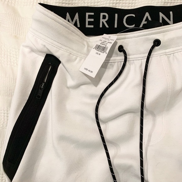american eagle white joggers